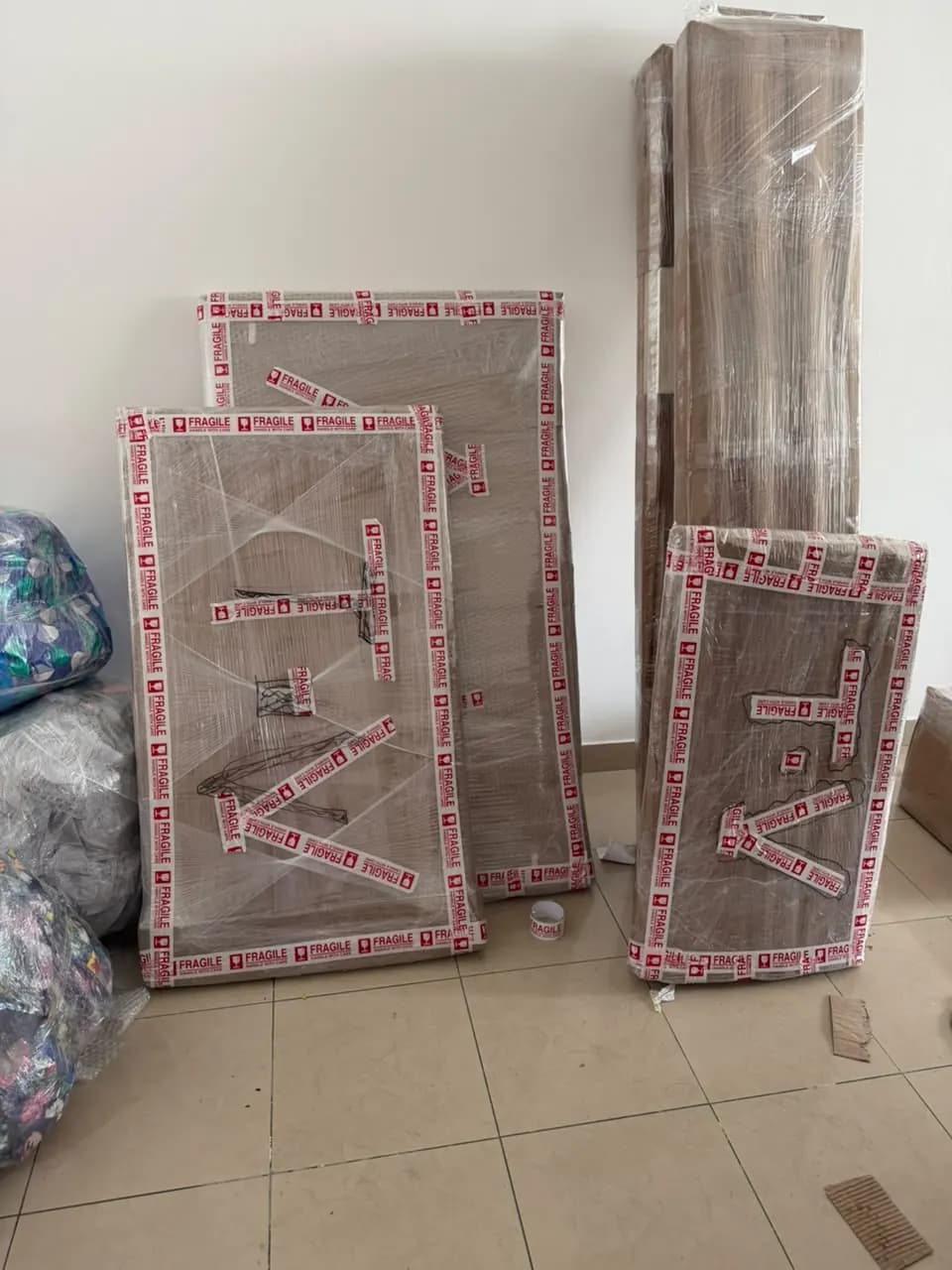 Smart Movers UAE crew packing and moving furniture in Dubai, UAE, job 19